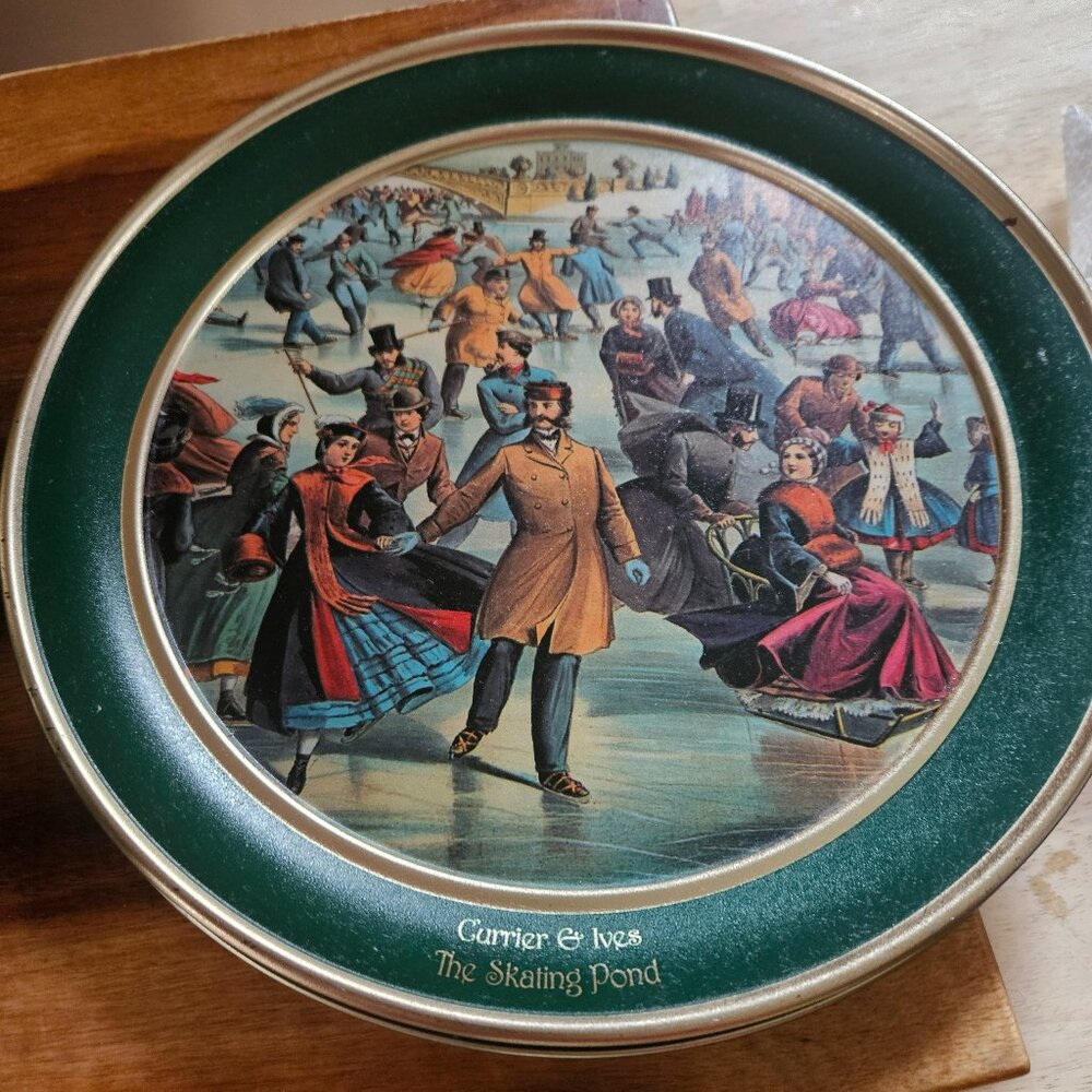 Currier &Ives tin filled with assorted items
